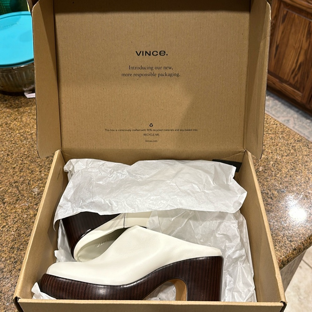 Brand Vince clogs.  Run slightly big so if you are 6.5 or 7 they will work.